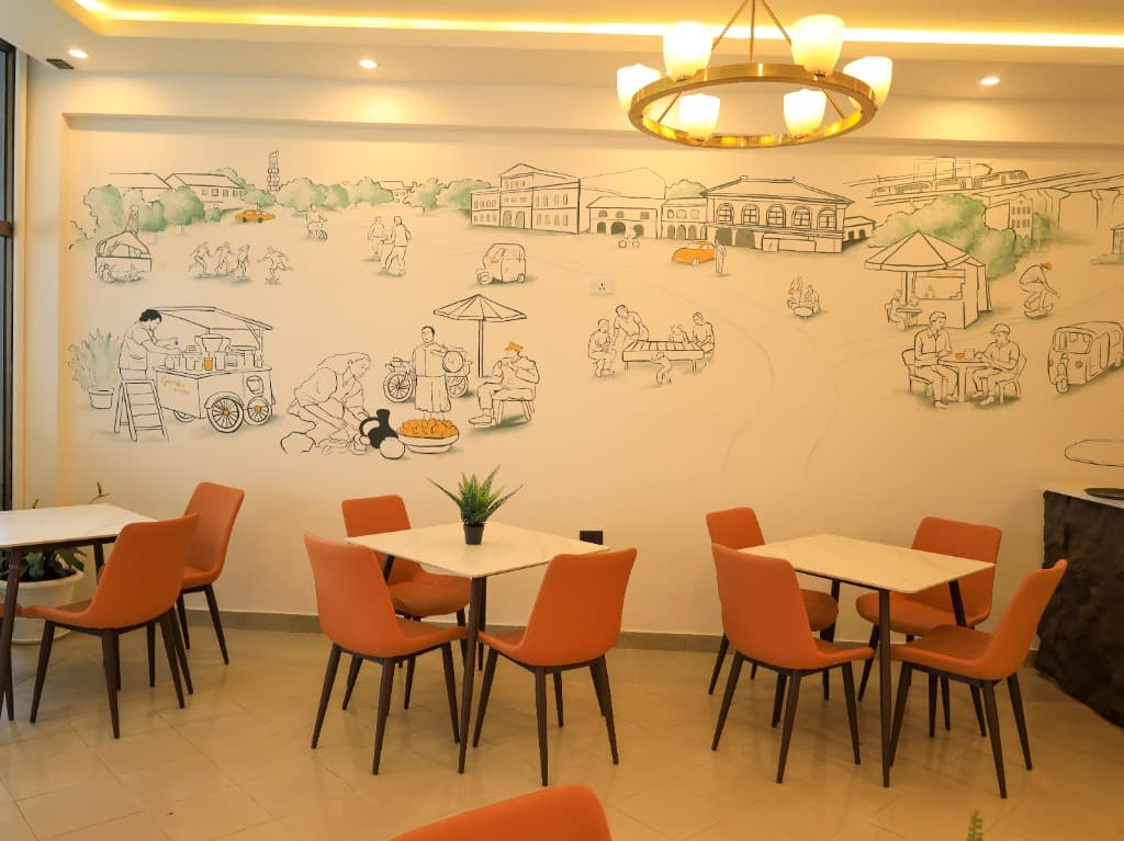 Gursha Kitchen Dining Space — Mural Wall and Orange Chairs